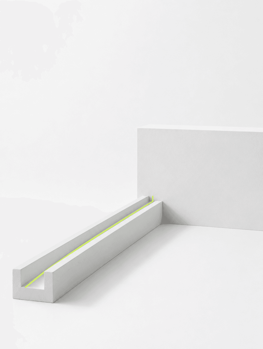 A lime line running along a white channel that ends abruptly against a blank wall